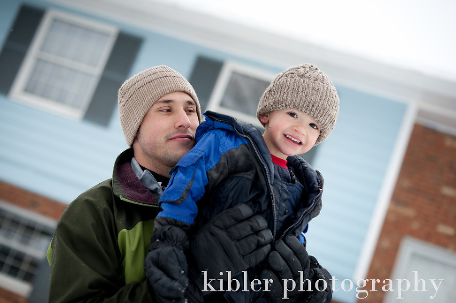 father and son on a snow day photo