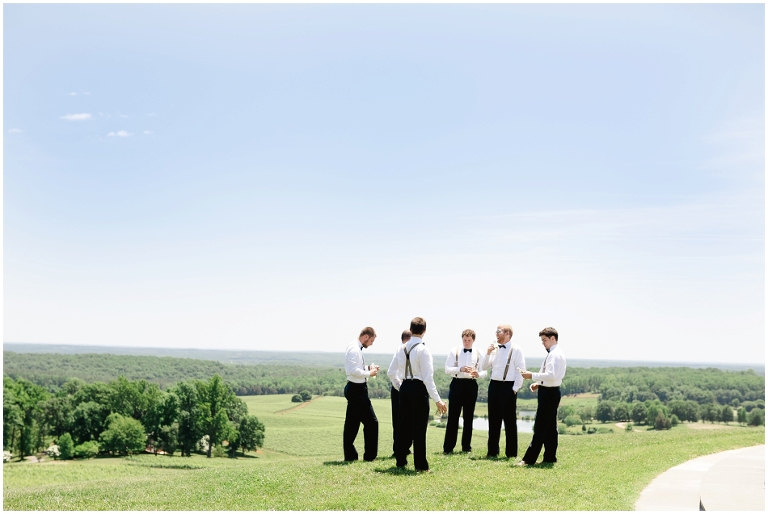 Grooms hanging out before wedding ceremony at Trump Winery with breathtaking views 