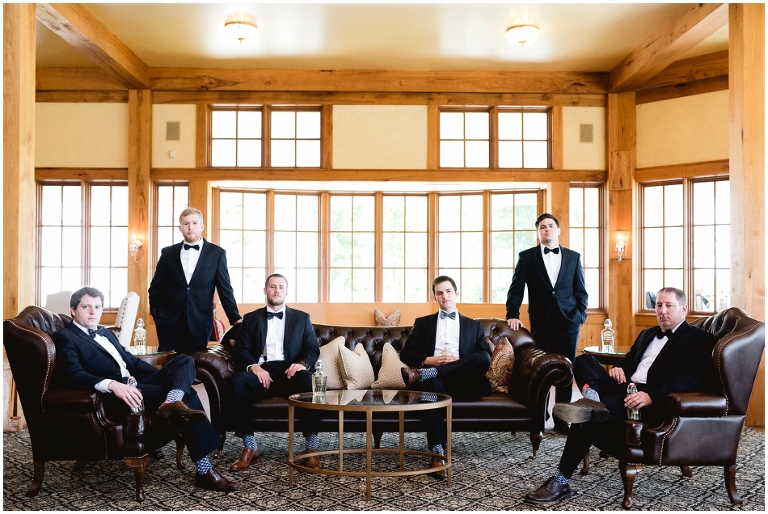 Trump Winery wedding with classic groomsmen in cigar room