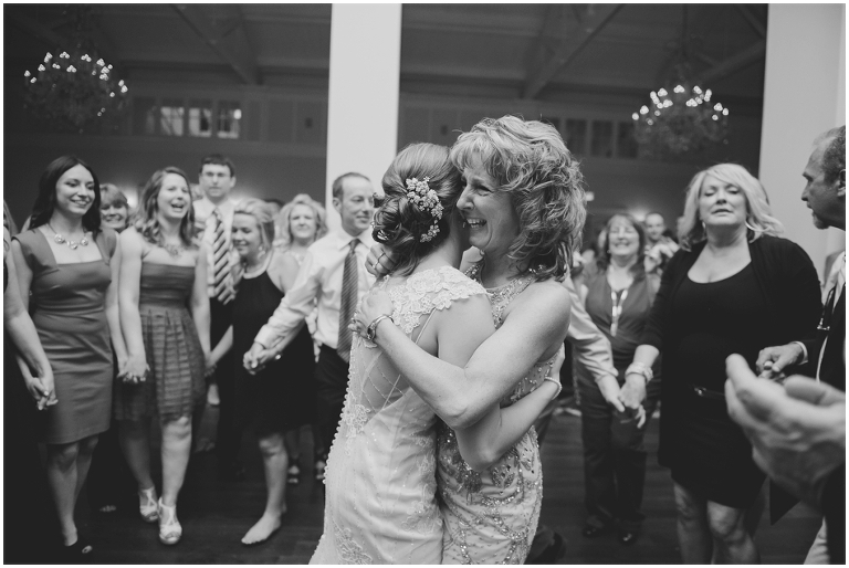 black and white emotional mom and daughter moment during a reception - Trump Winery wedding