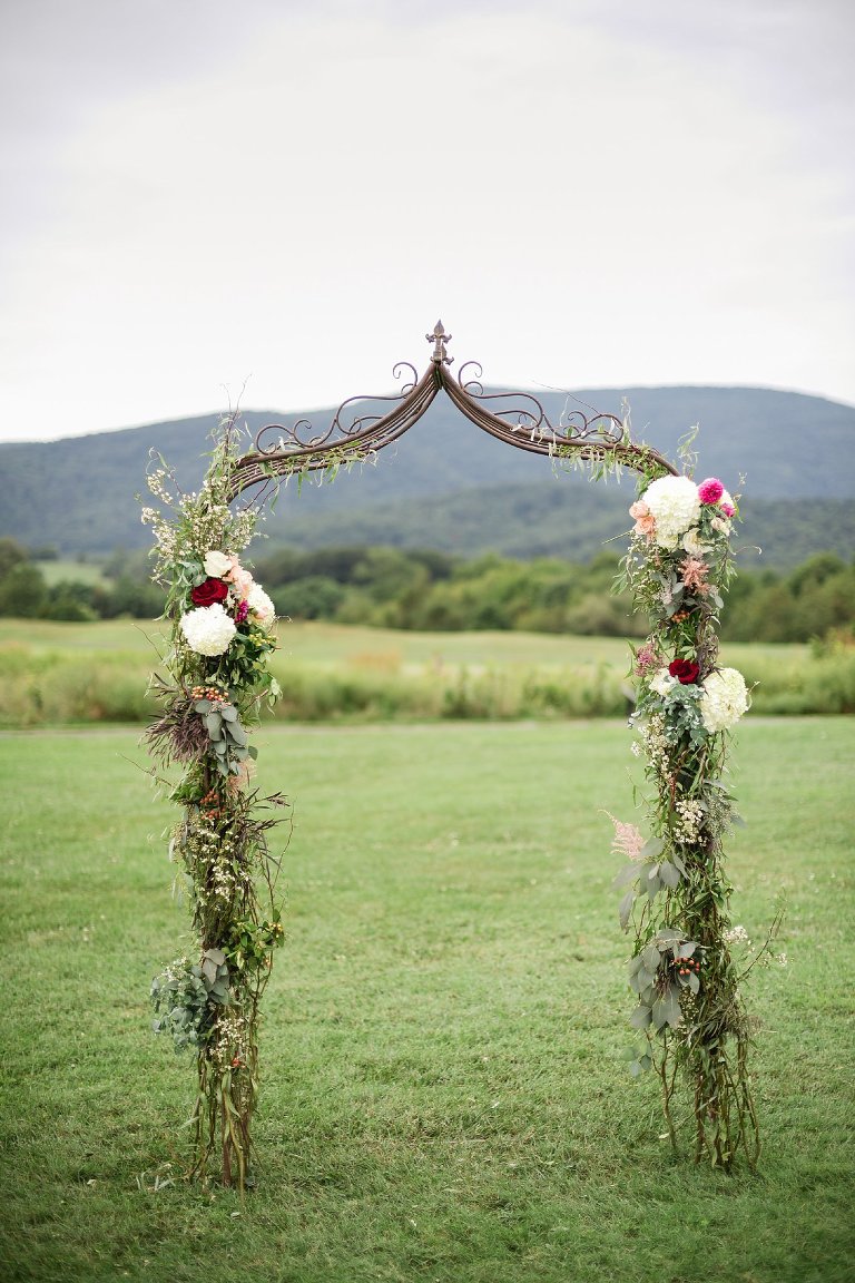 elegant rustic wedding ceremony arch