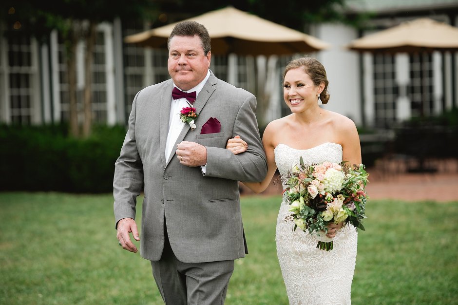 father walking daughter down the aisle