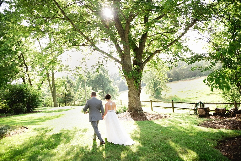 couple walking to their reception at Guildford Farm Ruckersville