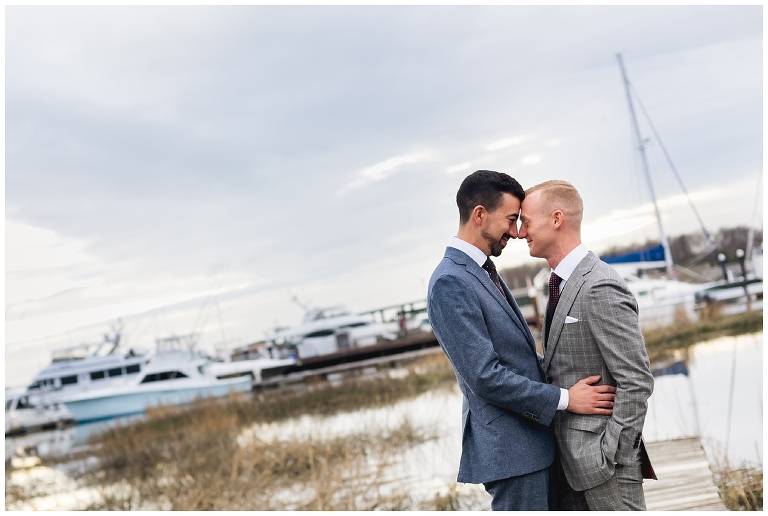 Grooms standing on pier - Charleston SC Wedding