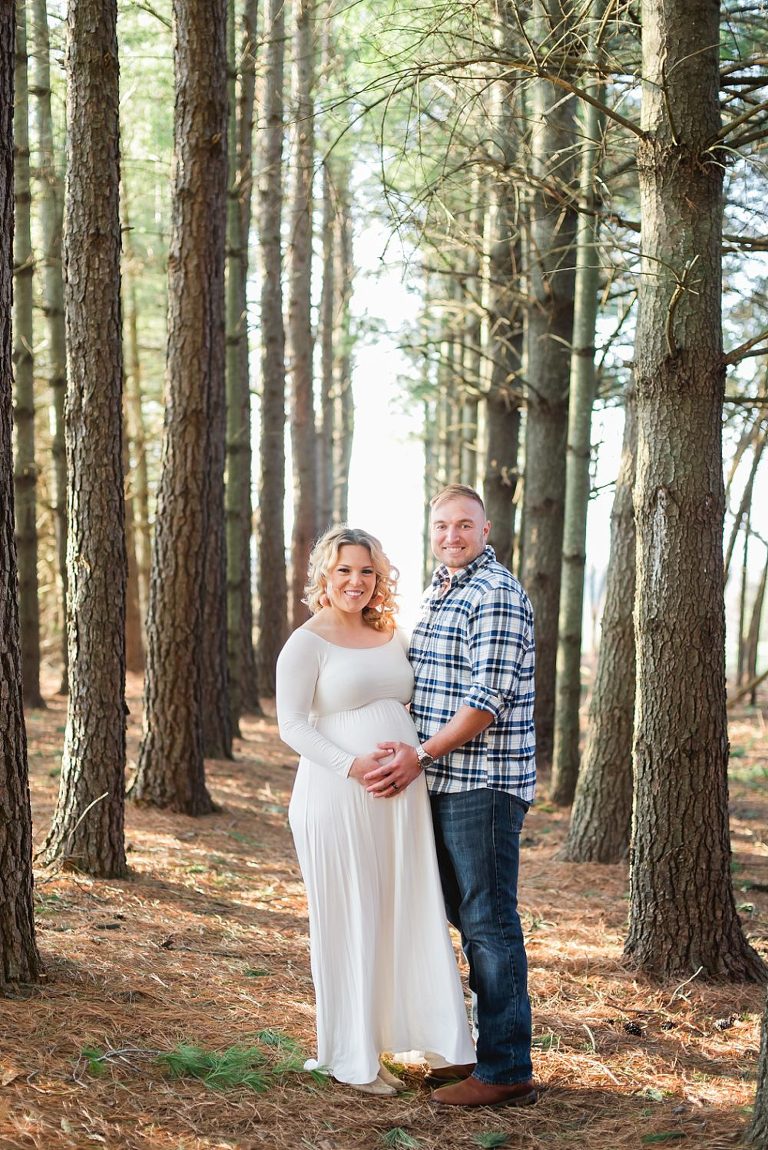 maternity photo in evergreen woods in Virginia
