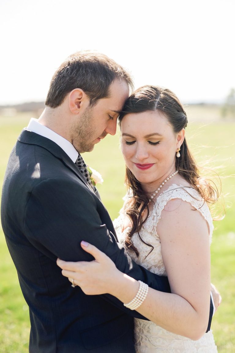 Early Mountain Vineyard wedding photos of groom and bride