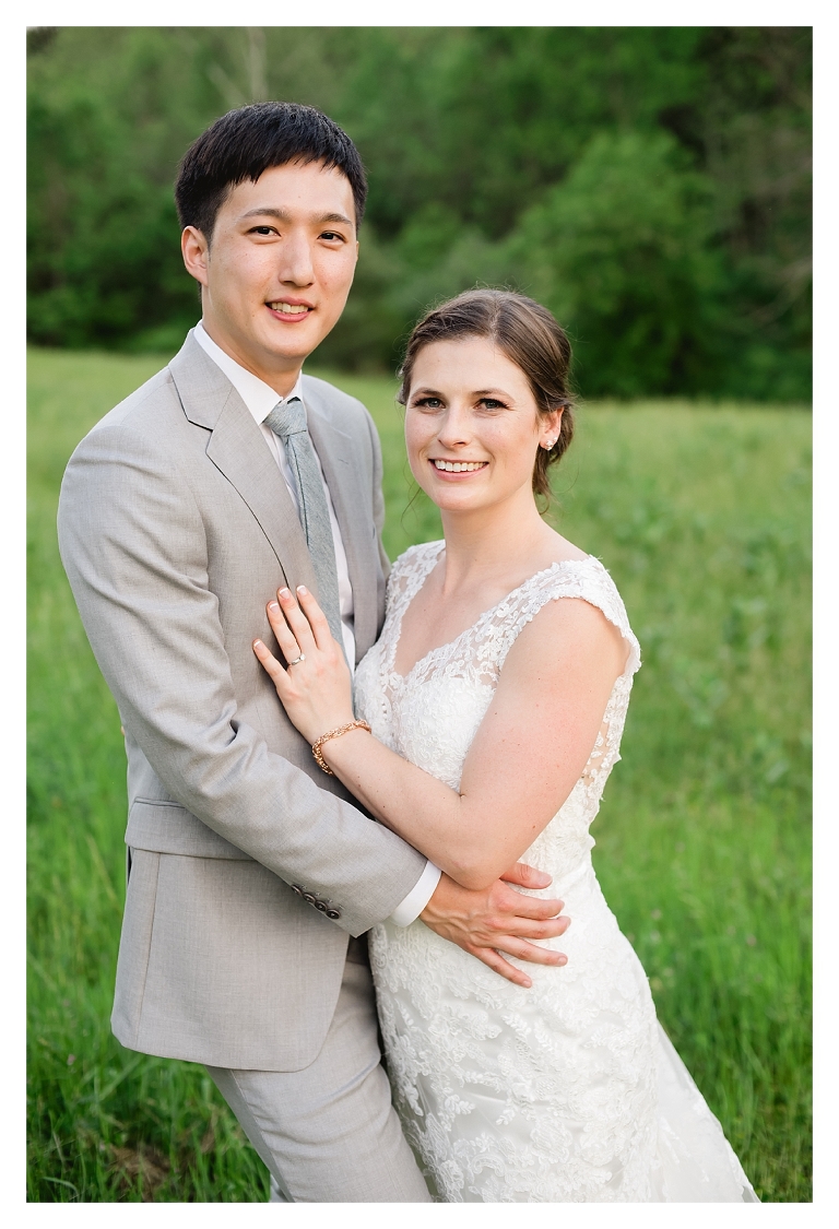 bride and groom portraits during country farm wedding at Guildford Farm