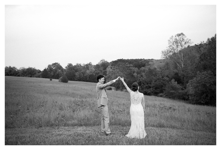 Charlottesville, Virginia Farm wedding venue photo with bride and groom dancing in the field