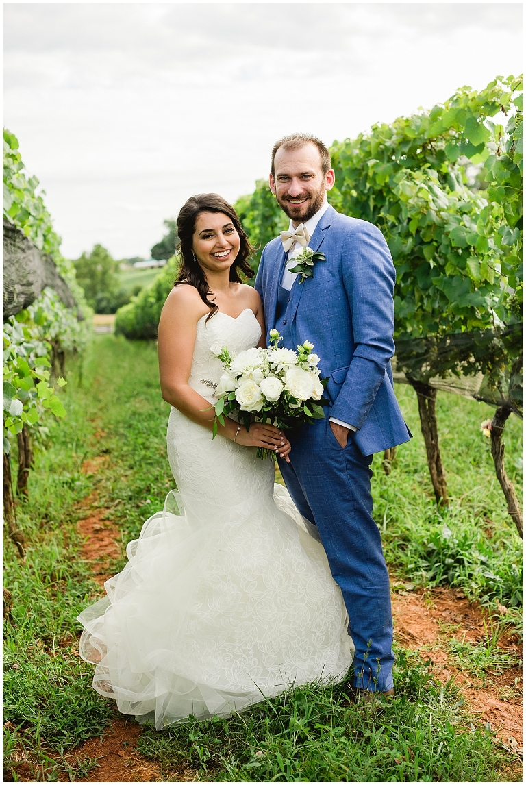 Couple in the vines Early Mountain Vineyard Wedding photographer