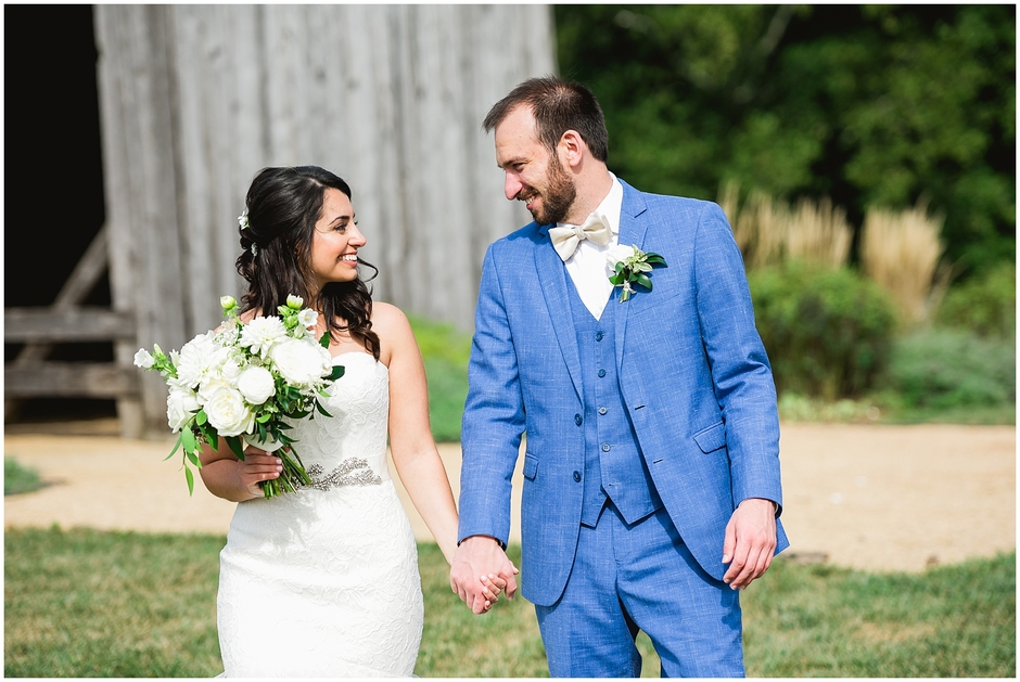 Wedding couple walking Early Mountain Vineyard Wedding