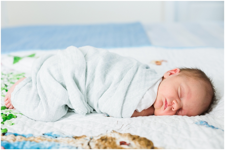 Session by Charlottesville Baby Photograph of newborn on Peter Rabbit blanket