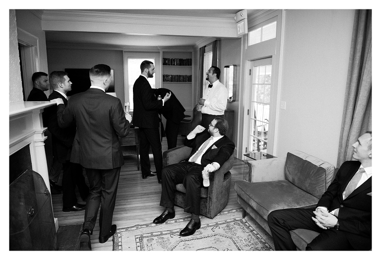 groomsmen hanging out in the groomsmen suite at Clifton inn