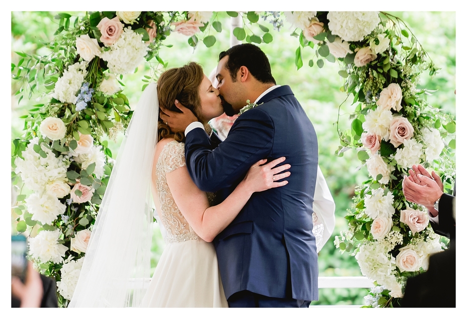 clifton inn wedding ceremony first kiss under tent
