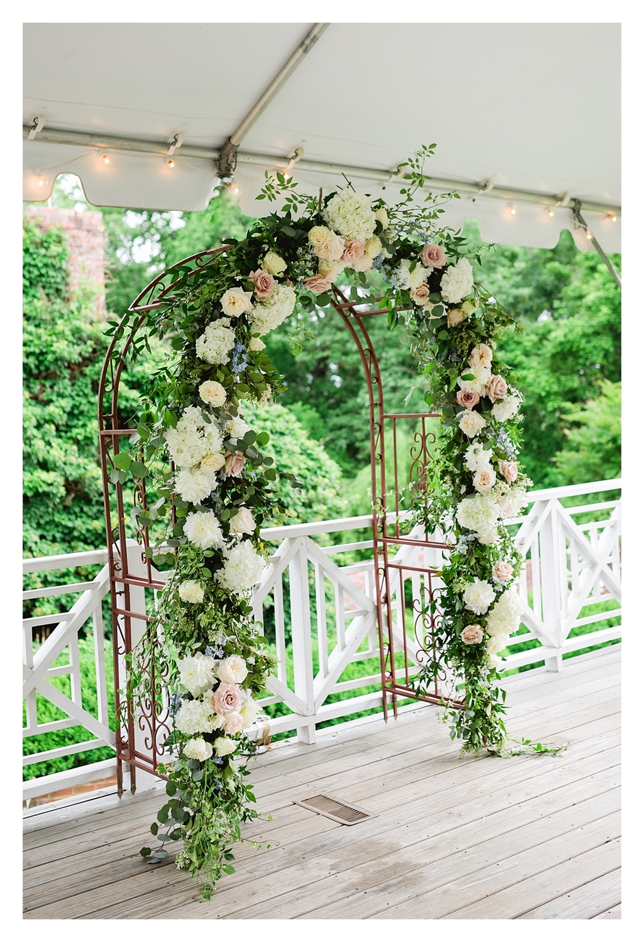 clifton inn wedding ceremony flowers under the tent